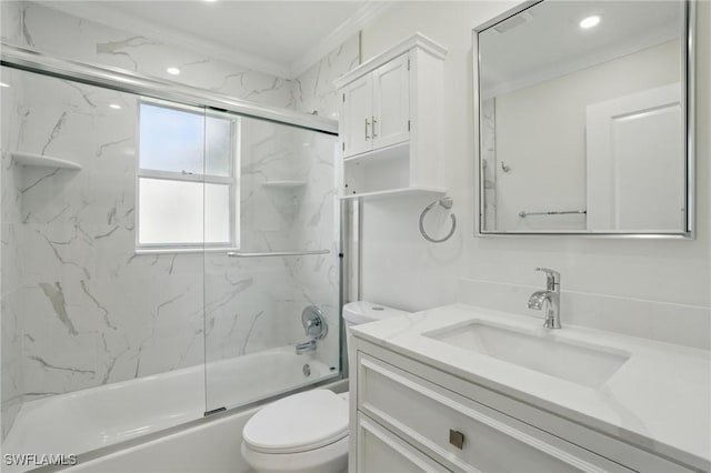 2203 SE Santa Barbara Pl, Cape Coral, FL 33990 - bathroom featuring toilet, crown molding, vanity, and combined bath / shower with glass door