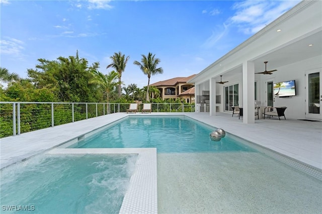 view of pool featuring fence, a fenced in pool, a patio, and ceiling fan