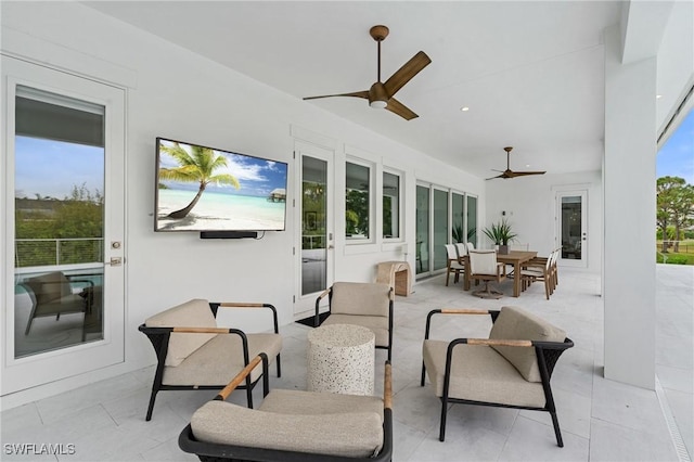 view of patio / terrace with outdoor dining space and ceiling fan