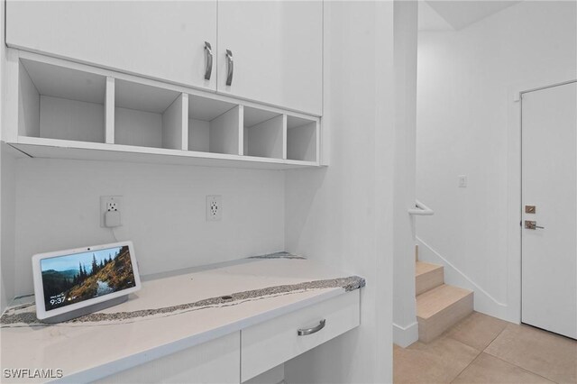 interior space with light tile patterned floors