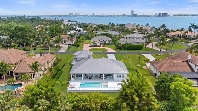 aerial view with a residential view and a water view