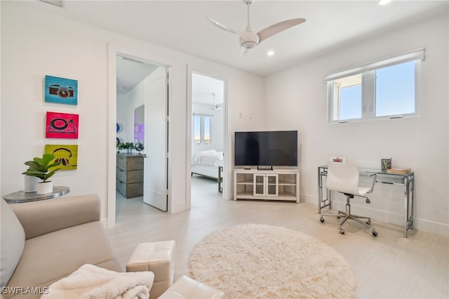 living room with plenty of natural light, baseboards, recessed lighting, and ceiling fan