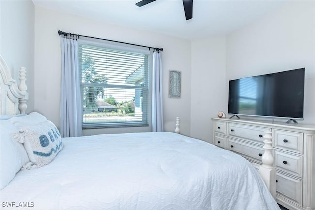 14696 Indigo Lakes Cir, Naples, FL 34119 - bedroom with ceiling fan and multiple windows