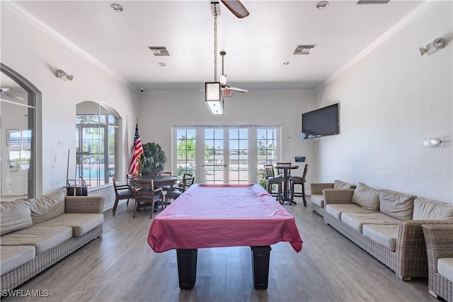 14696 Indigo Lakes Cir, Naples, FL 34119 - playroom with visible vents, crown molding, and a healthy amount of sunlight