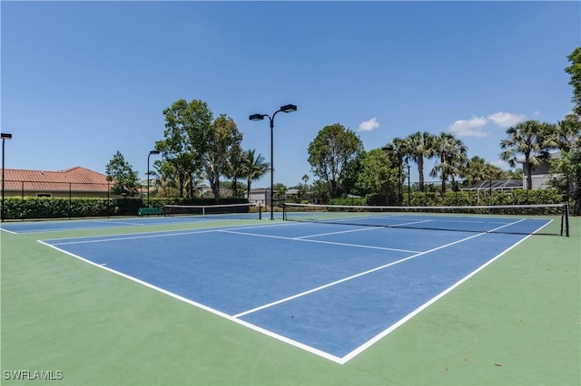 14696 Indigo Lakes Cir, Naples, FL 34119 - view of sport court featuring fence and community basketball court