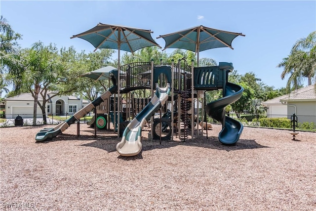 14696 Indigo Lakes Cir, Naples, FL 34119 - community jungle gym featuring fence
