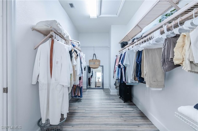 14696 Indigo Lakes Cir, Naples, FL 34119 - walk in closet with wood finished floors and visible vents
