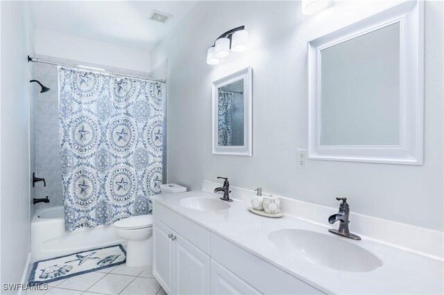 14696 Indigo Lakes Cir, Naples, FL 34119 - full bathroom featuring visible vents, tile patterned floors, toilet, and a sink