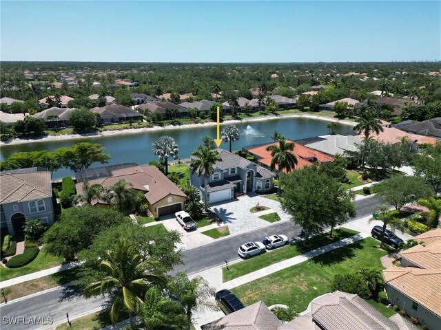 14696 Indigo Lakes Cir, Naples, FL 34119 - aerial view featuring a residential view and a water view
