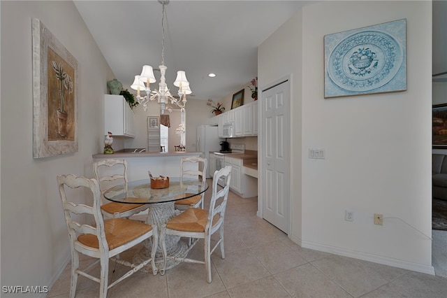 2165 Arielle Dr Unit 1605, Naples, FL 34109 - dining space featuring light tile patterned flooring, baseboards, recessed lighting, and an inviting chandelier