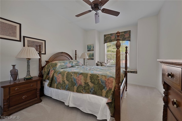 2165 Arielle Dr Unit 1605, Naples, FL 34109 - bedroom featuring a ceiling fan, light carpet, and baseboards