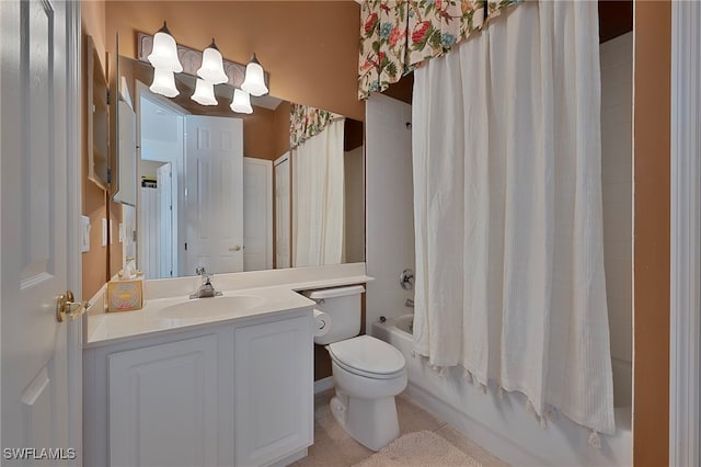2165 Arielle Dr Unit 1605, Naples, FL 34109 - full bath with tile patterned floors, toilet, shower / bath combo with shower curtain, and vanity