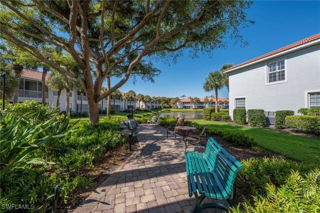 2165 Arielle Dr Unit 1605, Naples, FL 34109 - view of home's community featuring a residential view and a patio area