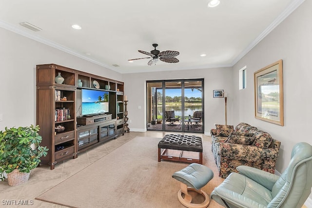 living room featuring recessed lighting, a ceiling fan, and crown molding