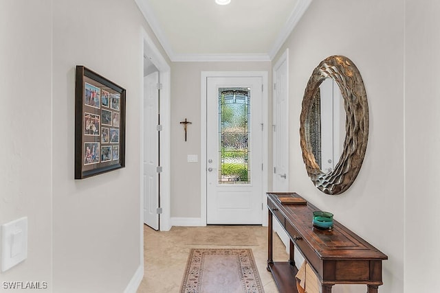 doorway featuring crown molding and baseboards