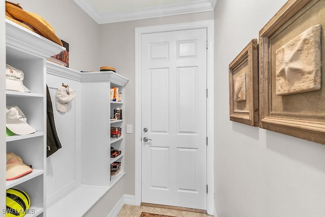 mudroom with crown molding and baseboards