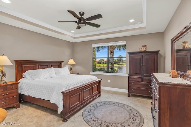 bedroom featuring recessed lighting, baseboards, and a raised ceiling