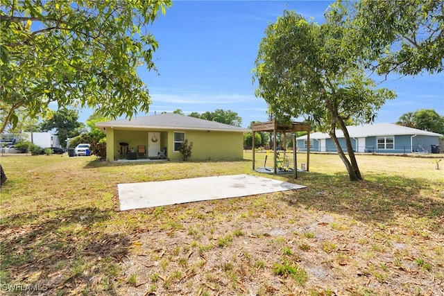 1938 Lillie St, Fort Myers, FL 33916 - view of green lawn featuring a patio