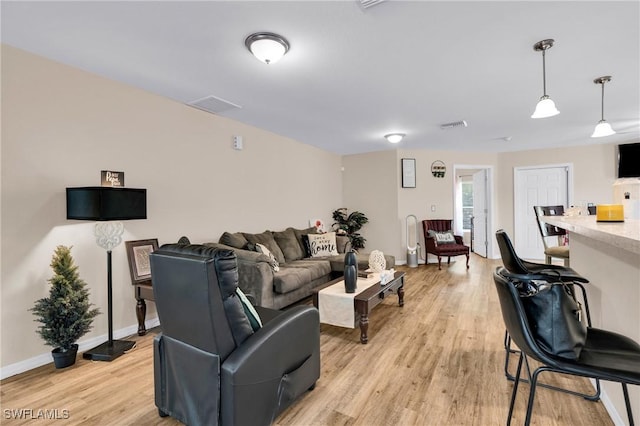 1938 Lillie St, Fort Myers, FL 33916 - living area with light wood-style floors and baseboards
