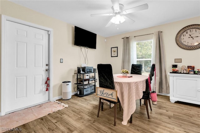 1938 Lillie St, Fort Myers, FL 33916 - dining room featuring light wood-style flooring, ceiling fan, and baseboards