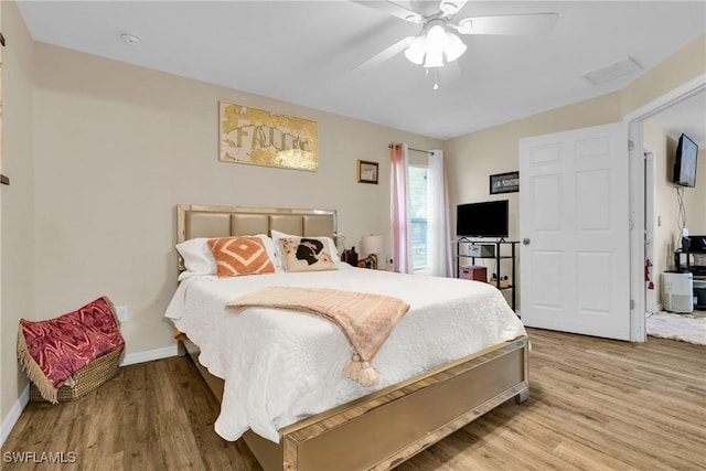 1938 Lillie St, Fort Myers, FL 33916 - bedroom featuring wood finished floors, baseboards, and ceiling fan