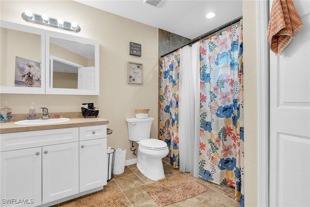 1938 Lillie St, Fort Myers, FL 33916 - bathroom featuring vanity, toilet, tile patterned floors, and a shower with shower curtain