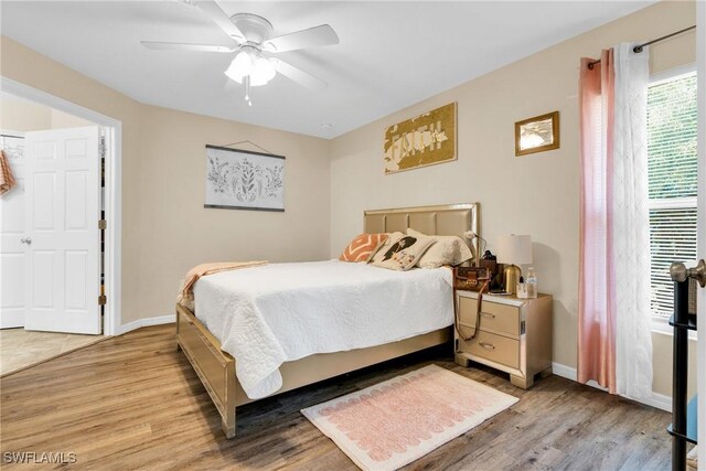 1938 Lillie St, Fort Myers, FL 33916 - bedroom featuring light wood-style floors, baseboards, and ceiling fan
