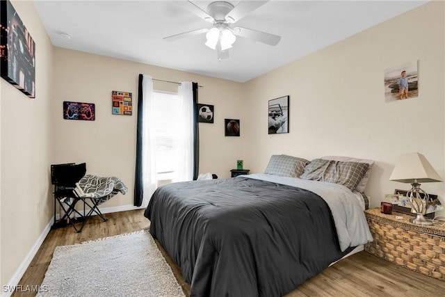 1938 Lillie St, Fort Myers, FL 33916 - bedroom featuring wood finished floors, baseboards, and a ceiling fan