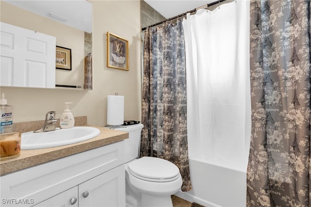 1938 Lillie St, Fort Myers, FL 33916 - full bathroom with vanity, toilet, shower / tub combo, and tile patterned flooring
