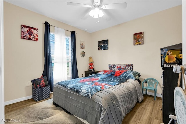 1938 Lillie St, Fort Myers, FL 33916 - bedroom featuring wood finished floors, baseboards, and a ceiling fan