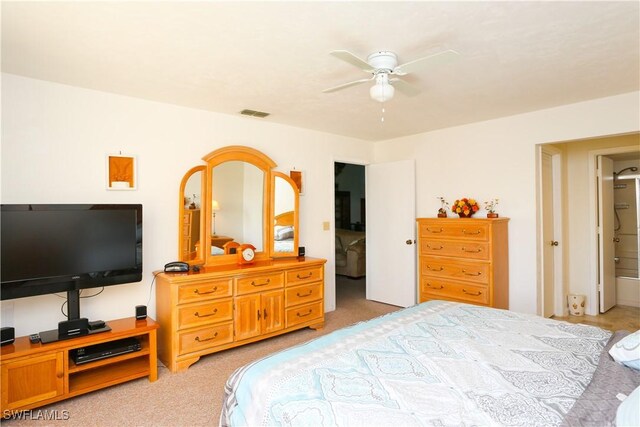 4030 Northlight Dr, Naples, FL 34112 - bedroom with light carpet, a ceiling fan, and visible vents