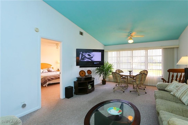 4030 Northlight Dr, Naples, FL 34112 - carpeted living area featuring vaulted ceiling, visible vents, baseboards, and ceiling fan