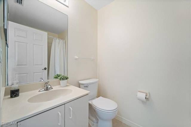 6560 Huntington Lakes Cir Unit 102, Naples, FL 34119 - full bathroom with toilet, vanity, baseboards, and visible vents