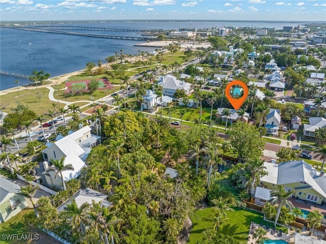 bird's eye view featuring a residential view and a water view