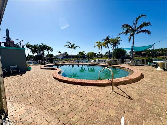 pool featuring a patio