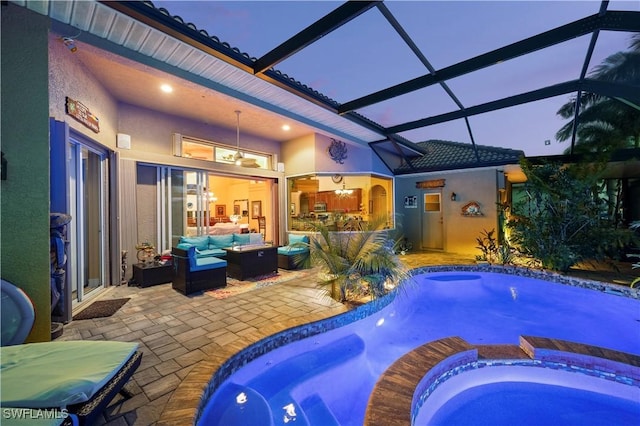211 Lido Dr, Punta Gorda, FL 33950 - view of pool with a patio, a pool with connected hot tub, glass enclosure, and an outdoor hangout area