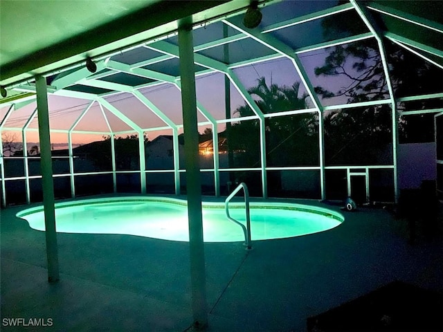 outdoor pool with glass enclosure