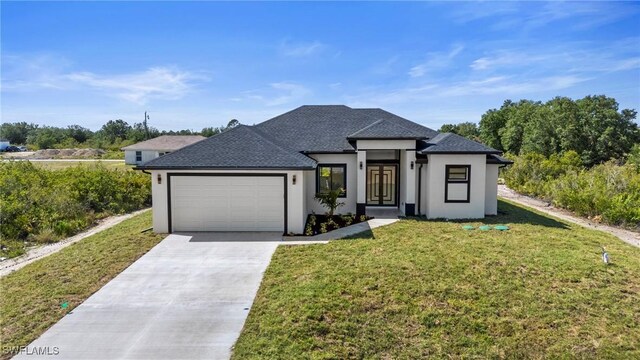 2705 68th St W, Lehigh Acres, FL 33971 - view of front of property with driveway, an attached garage, a shingled roof, a front yard, and stucco siding