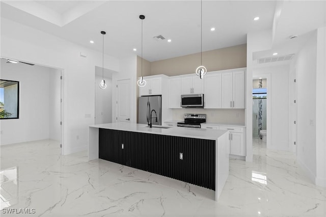 2705 68th St W, Lehigh Acres, FL 33971 - kitchen featuring white cabinets, marble finish floor, stainless steel appliances, visible vents, and a sink