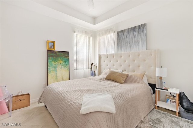 tiled bedroom with baseboards