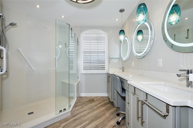 20211 Burnside Pl Unit 203, Estero, FL 33928 - full bath with wood finished floors, a stall shower, and a sink