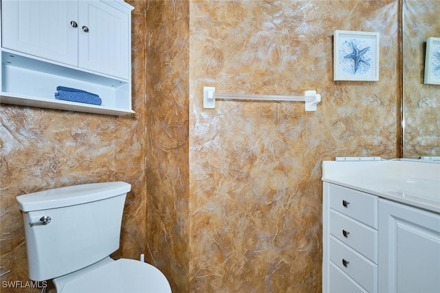 20211 Burnside Pl Unit 203, Estero, FL 33928 - bathroom featuring toilet and vanity