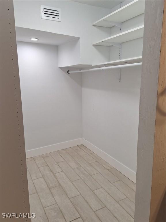 spacious closet with visible vents