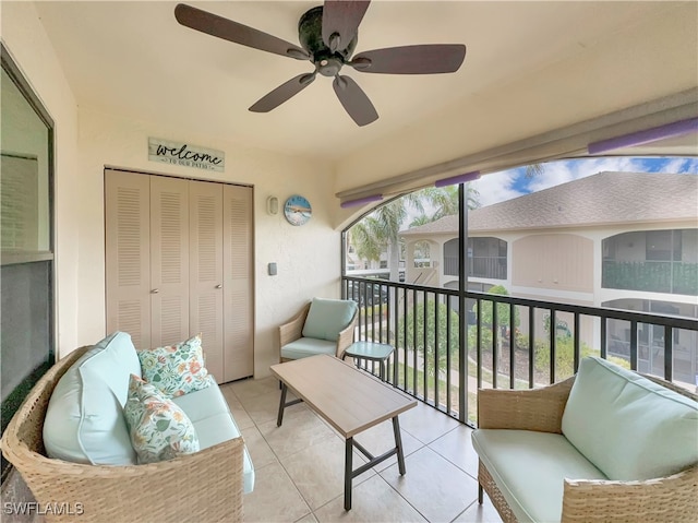 balcony with ceiling fan and an outdoor hangout area