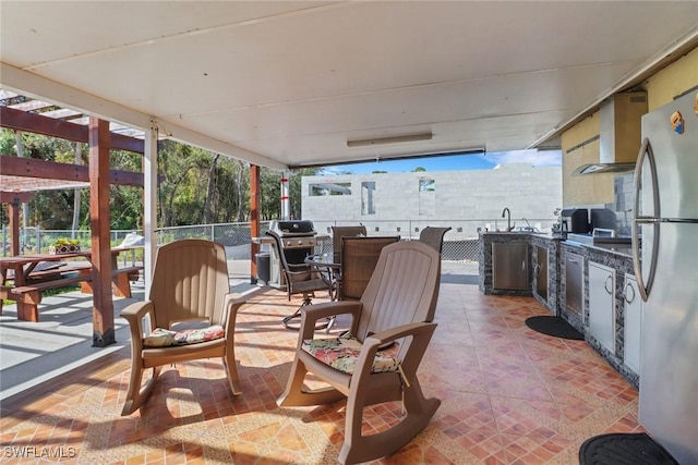 2420 6th Ave SE, Naples, FL 34117 - view of patio / terrace with a pergola, an outdoor kitchen, and area for grilling