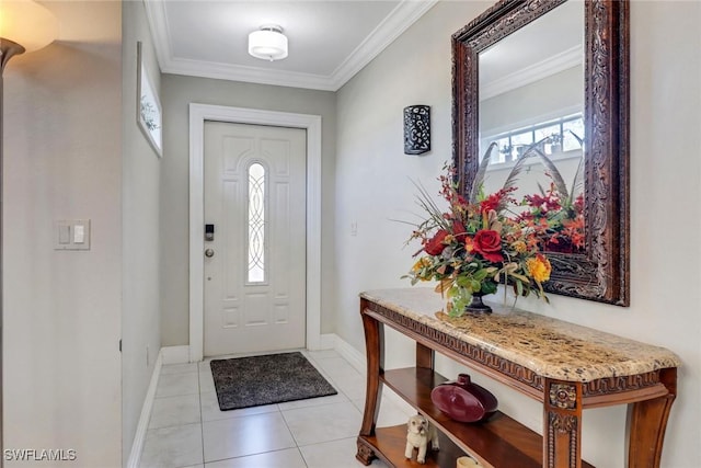 2420 6th Ave SE, Naples, FL 34117 - entryway featuring crown molding, baseboards, and light tile patterned flooring