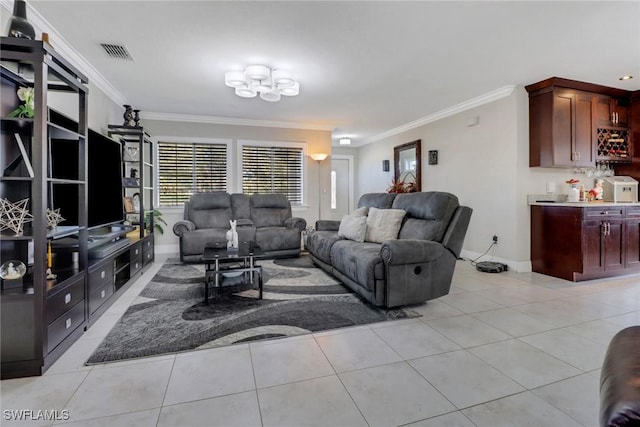 2420 6th Ave SE, Naples, FL 34117 - living area with a notable chandelier, baseboards, ornamental molding, light tile patterned flooring, and visible vents