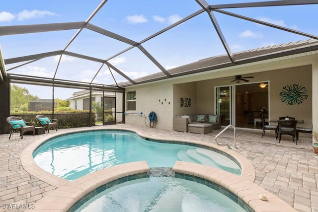 16148 Bonita Landing Cir, Bonita Springs, FL 34135 - view of swimming pool with a patio area, a pool with connected hot tub, and an outdoor hangout area