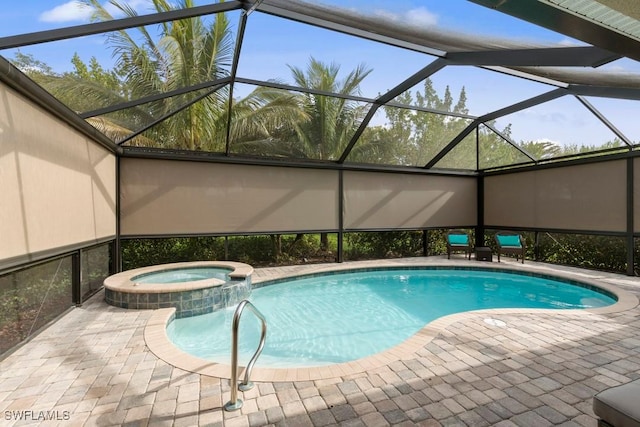 16148 Bonita Landing Cir, Bonita Springs, FL 34135 - view of pool featuring a pool with connected hot tub, a patio area, and a lanai