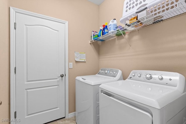 16148 Bonita Landing Cir, Bonita Springs, FL 34135 - laundry area featuring washing machine and clothes dryer and laundry area